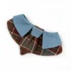 Close-up of the woven plaid fabric and soft collar of the british style pet apparel