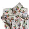 Close-up fabric of Vibrant Summer Pet Clothes smiling floral shirt