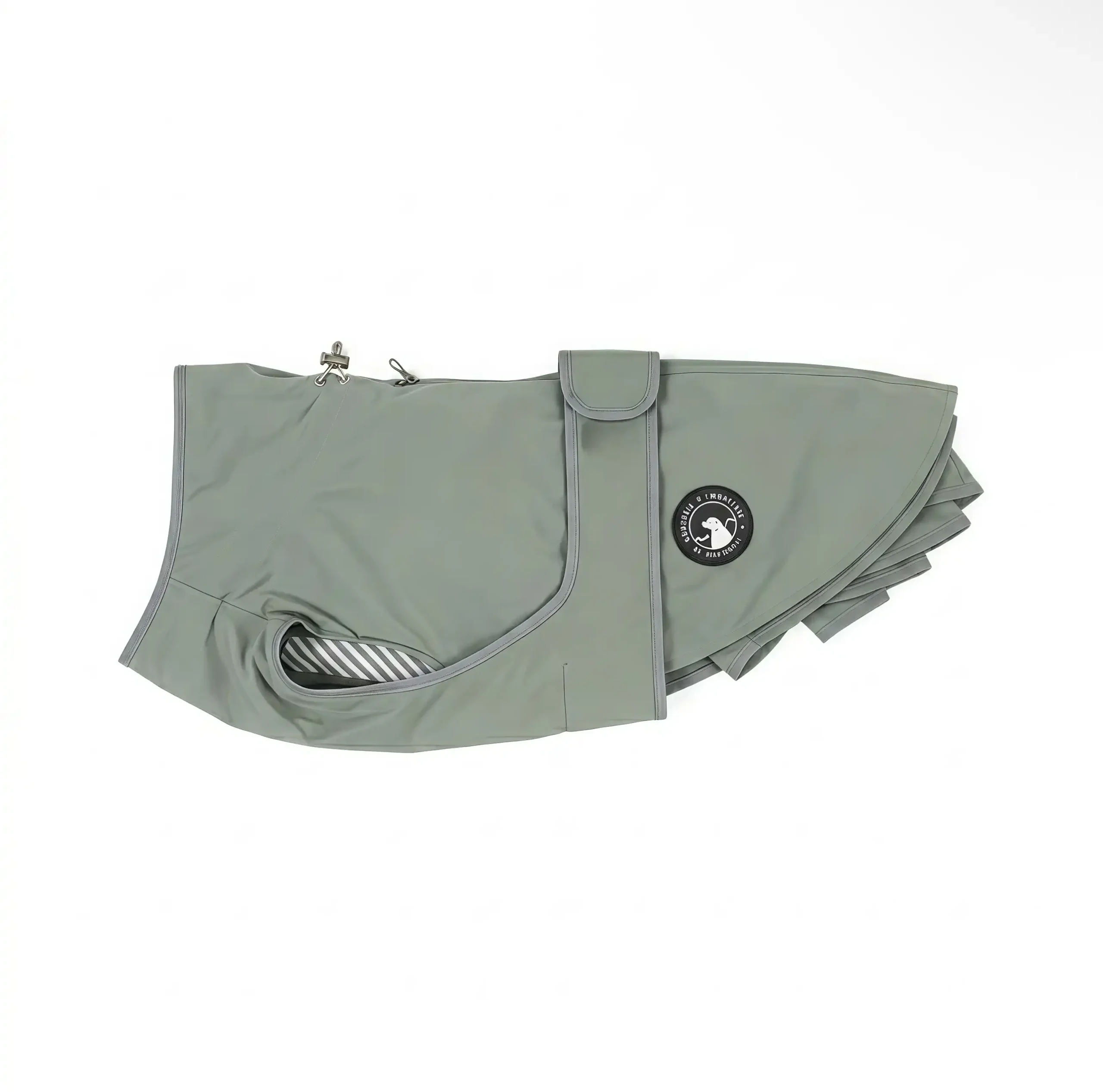 Side profile of Sage Green small dog raincoat with striped lining.